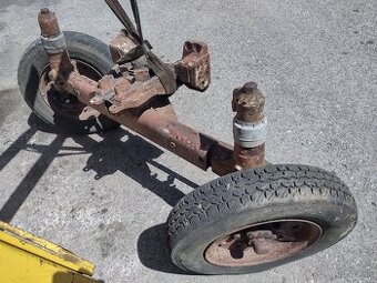 Odpruzena naprava zetor