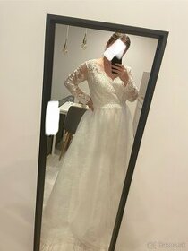 Biele svadobné šaty