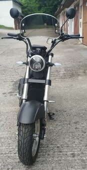 Elektrokolobežka so sedlom EcoWHEEL