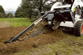 Ryhovanie ,drazkovanie trencher -pripojky vody ,elektriky