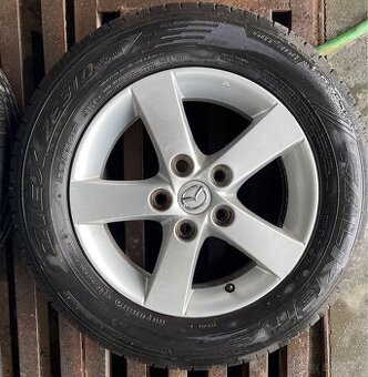5x114,3 R15 6J ET52,5 Mazda + 195/65 R15 Falken