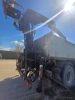 Man s hydraulicku rukou sklapac