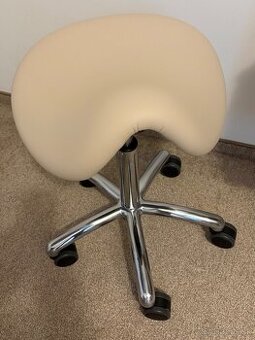 Nová ergonomická sedlová stolička na kolieskach (krémová)