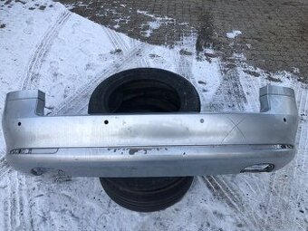 ŠKODA OCTAVIA 2 COMBI 09-13 ZADNÝ NARAZNIK S OTVORMI PDC