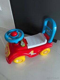 Odrážadlo Fisher-price + hračky
