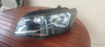 VW Caddy ľavé predné svetlo