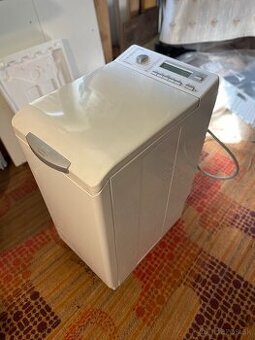 Práčka z hora plnena Electrolux L47030