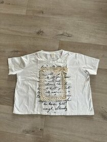 Oversize bavlnené tričko s nápisom a čipkou