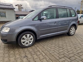 Predám Volkswagen Touran 1.9 TDI 77 KW..7-miestny,Tažné,Navi