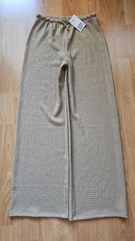 Nohavice nové, zn. H&M