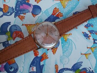 Hodinky Raketa - pozlátené.