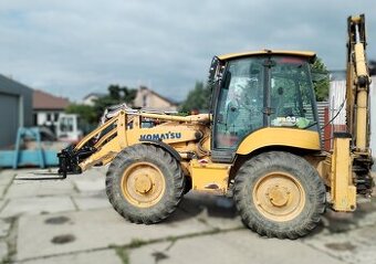 rychloupinac komatsu wb traktorbager + paletizacne vidly WB