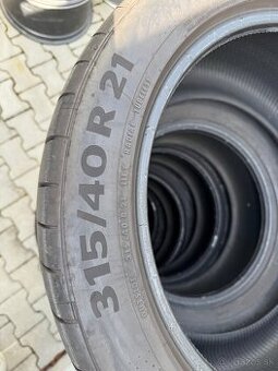 315/40 R21”