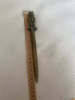 Mosadzný otvárač listov