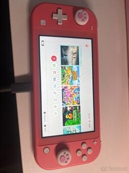 Nintendo Switch Lite + hry