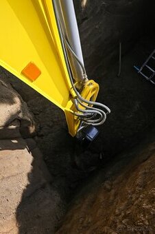 Vykopove a planirovacie prace traktorbagrom a pasovym BAGROM