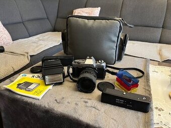 Minolta X-300 + Tokina 28-70 f2.8-4.3 + príslušenstvo
