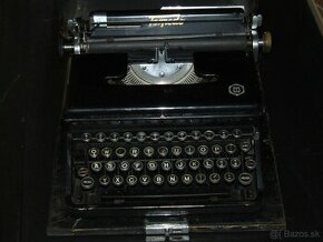 predá písací stroj