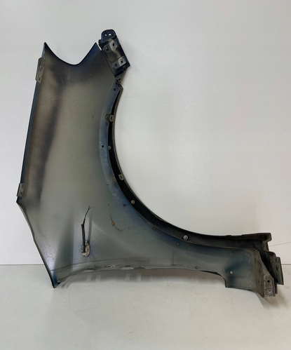 Suzuki SX4 2006- ľavý blatník - 2