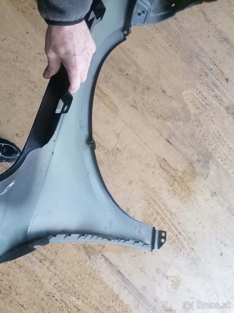 Passat b7 - Ľavý blatník +svetlo halogen - 2