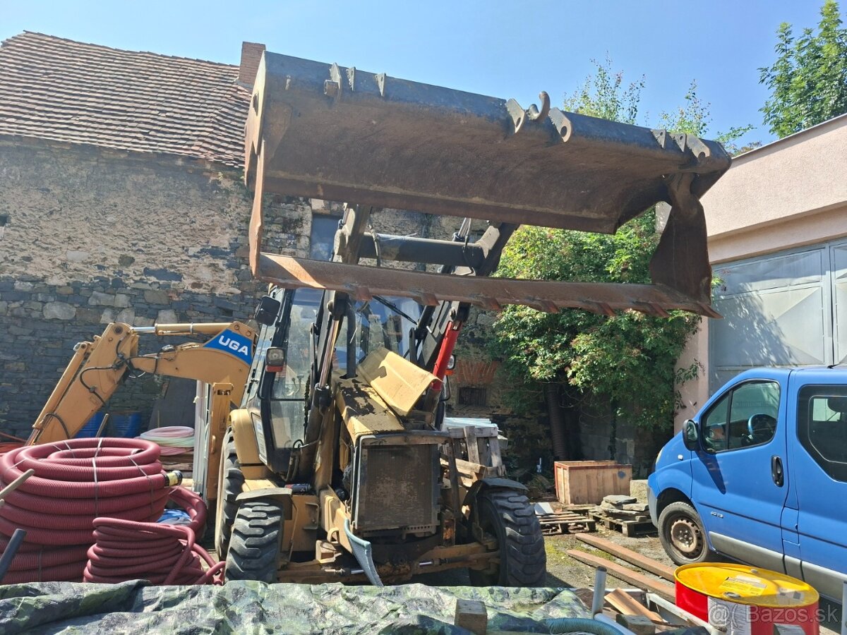 CATERPILLAR 428 C 4X4 - 2
