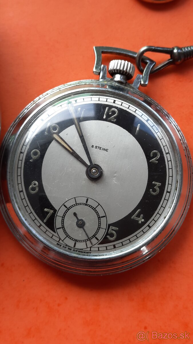 Vreckove hodinky . - 2