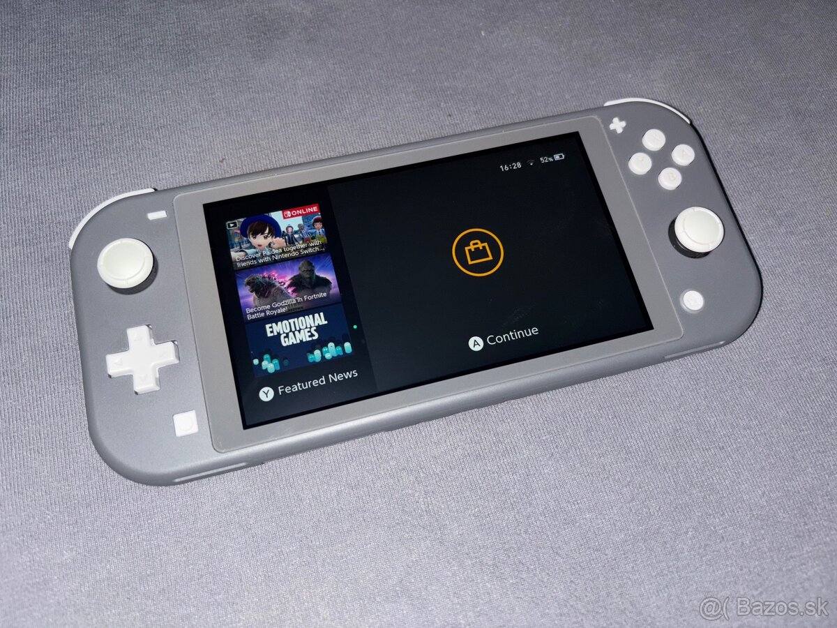 Nintendo switch Lite 256Gb z krytom a 34 hry - 2