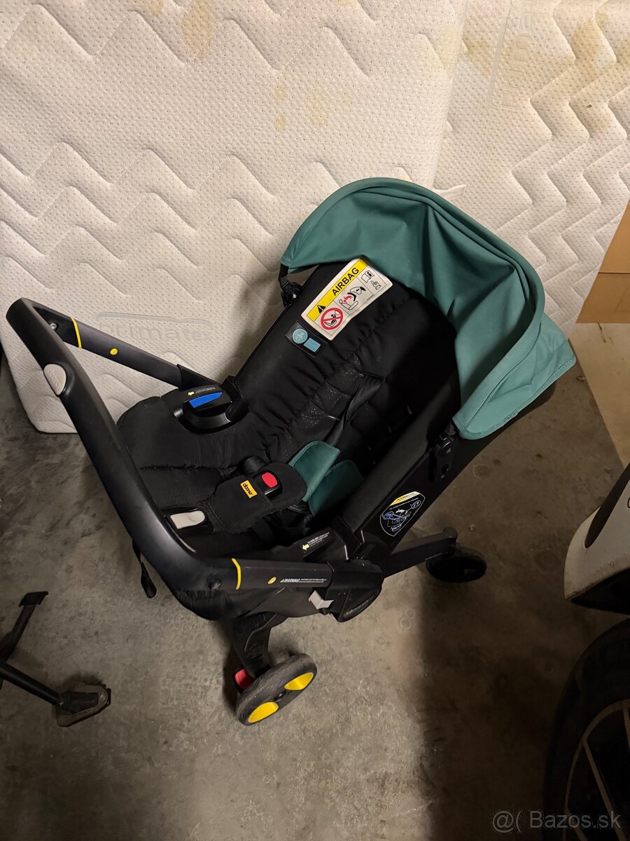 Doona PLUS Autosedačka s integrovaným podvozkom 2v1 - 2