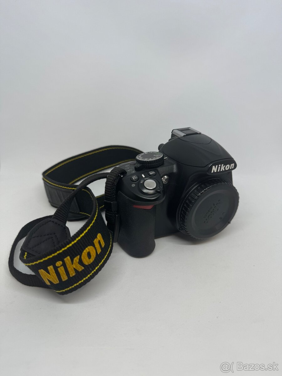 Nikon D3100 + NIKKOR 18-105 - 2