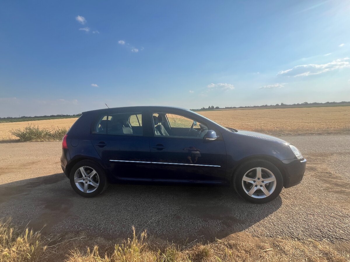 VW Golf 5 - 1.4 benzin - 2