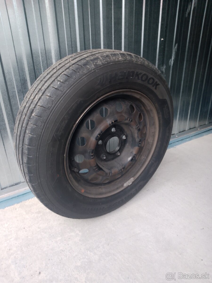 4ks plechové disky s letnymi pneumatikami 196/65 R15. - 2