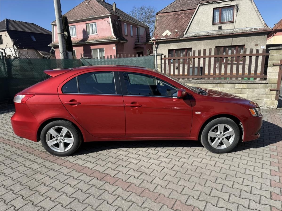 Prodám Mitsubishi Lancer 1.8 105kW 2009 119755km - 2