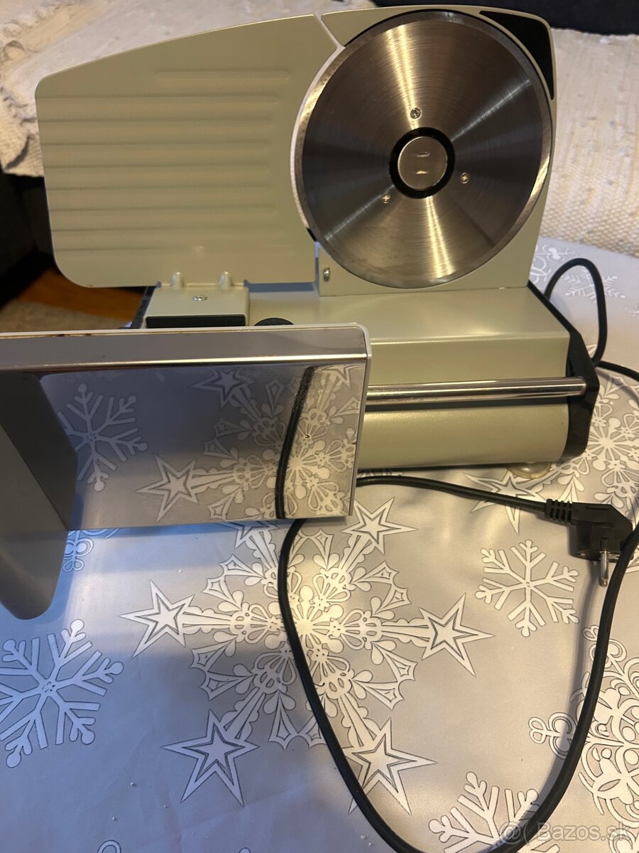 Predam krajac eletricky na chleb a salamu eta Questo - 2