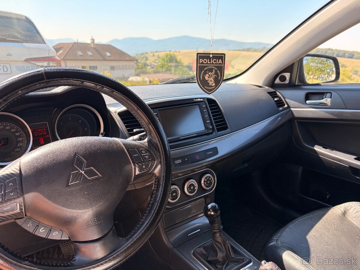Mitsubishi lancer 2.0 103kw - 2