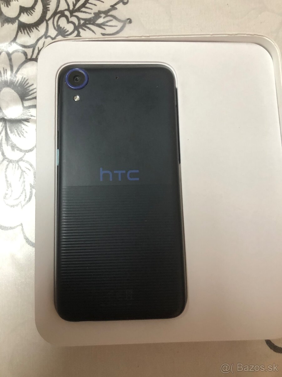 Predám dotikový telefón HTC650 R-16 - 2