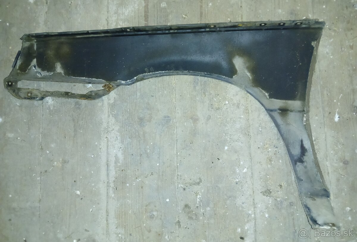 Mitsubishi Lancer 1984-88 - pravý blatník - 2