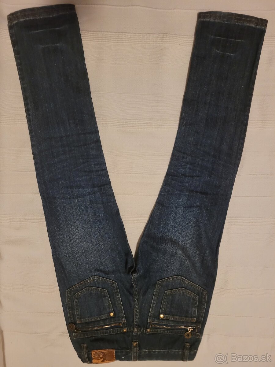 Džínsy 132cm/9r. - 2