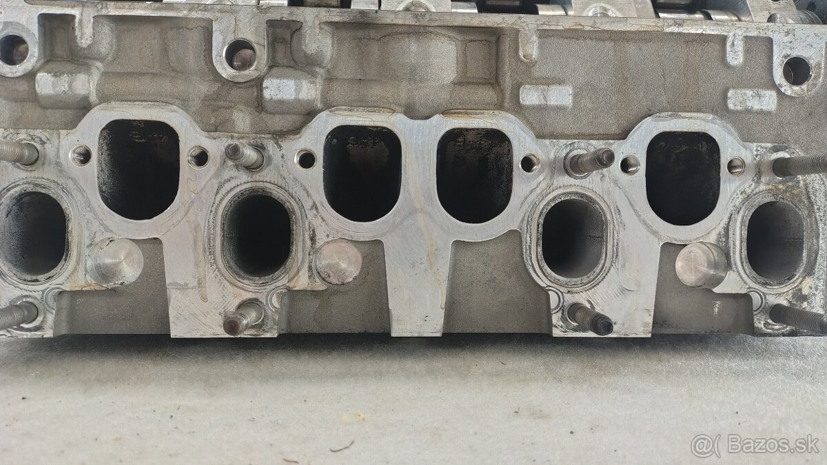 Hlava motoru 1.9 tdi 96kw + vstrekovače - 2