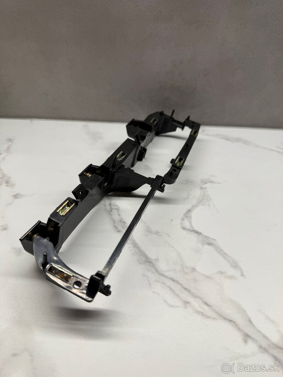 Držiak madla dverí VW - 2