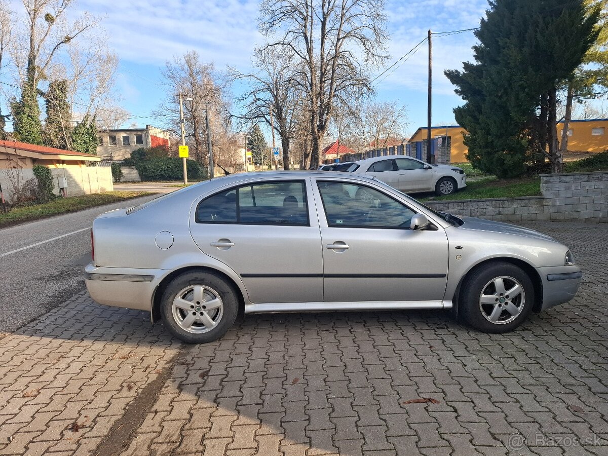 Škoda octavia 1.6 kw75 - 2