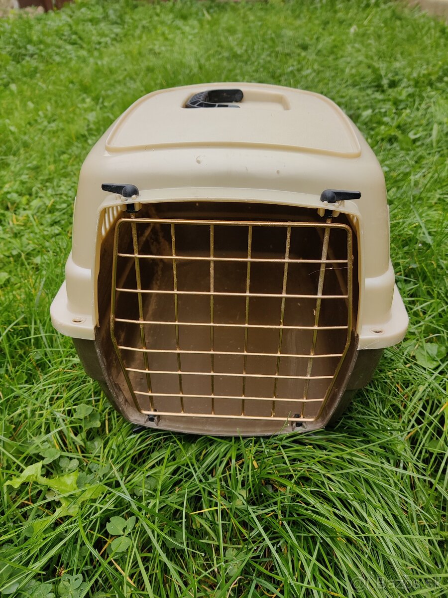 prenosná klietka a 2 knihy - 2