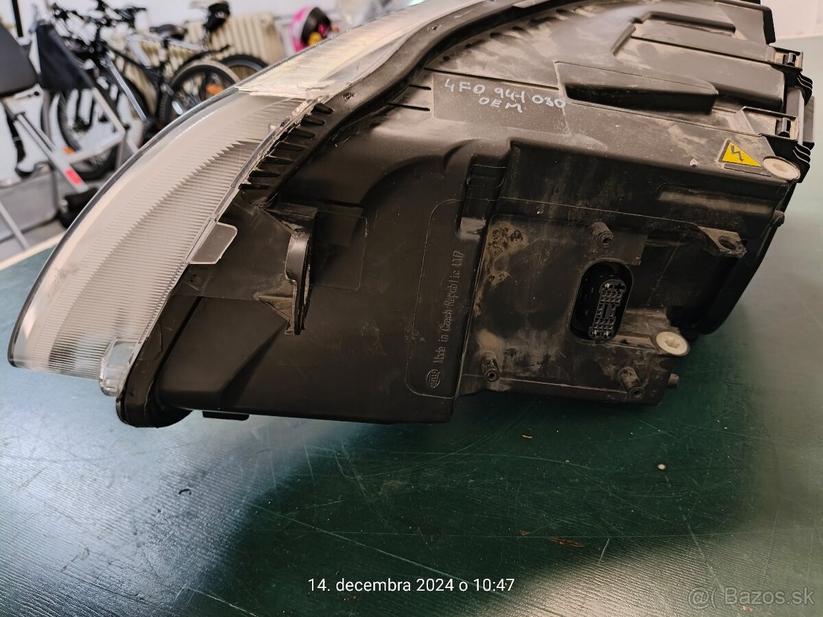 Pravý natacaci bixenon Audi A6 C6 4f originál Hella - 2