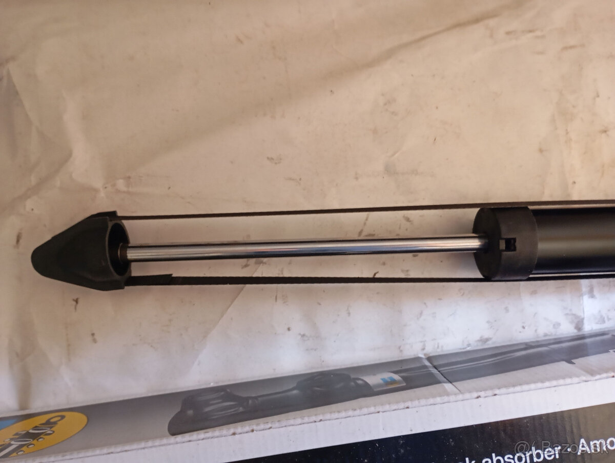 Zadný tlmič pruženia. - 2