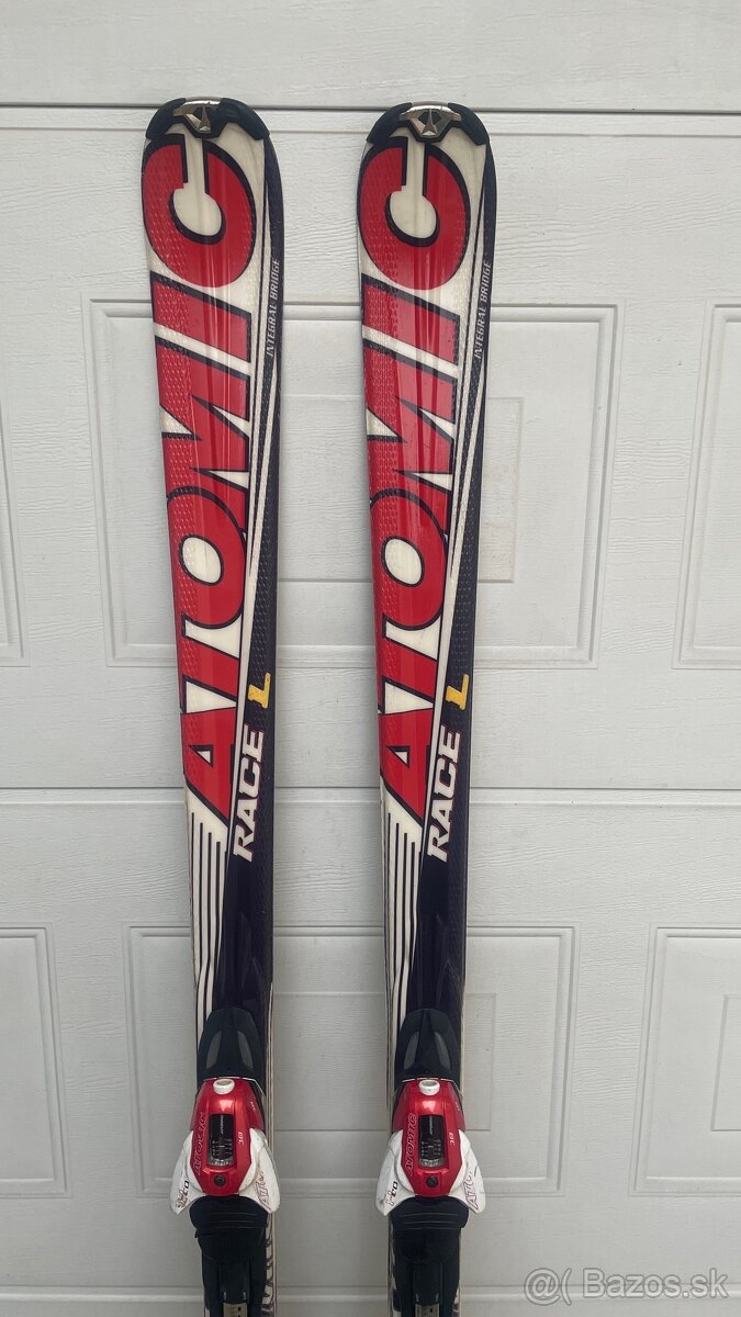 Lyze Atomic 170-175 cm + palice - 2