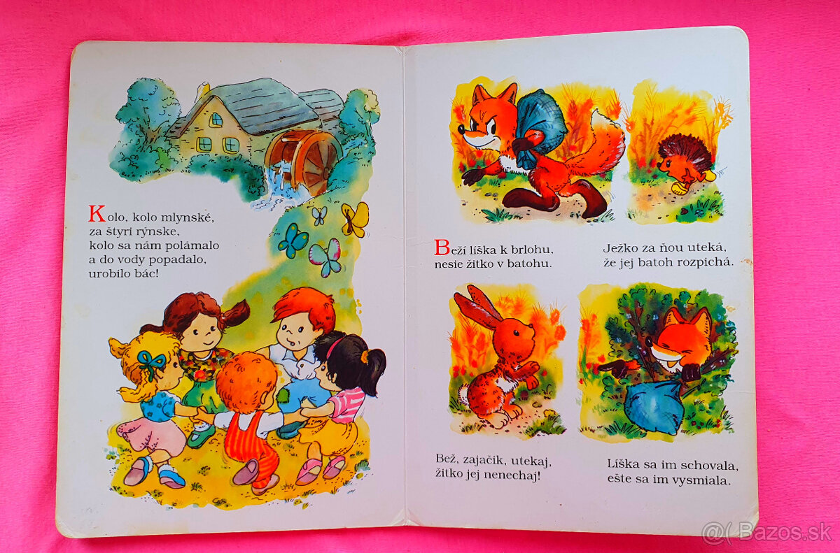 Mačka lezie dierou oknom pes. - 2