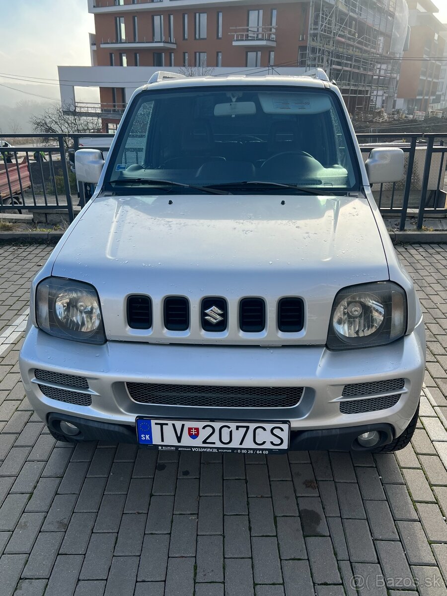 Suzuki Jimny 4x4, 1.3i, 63kW- strieborný - 2