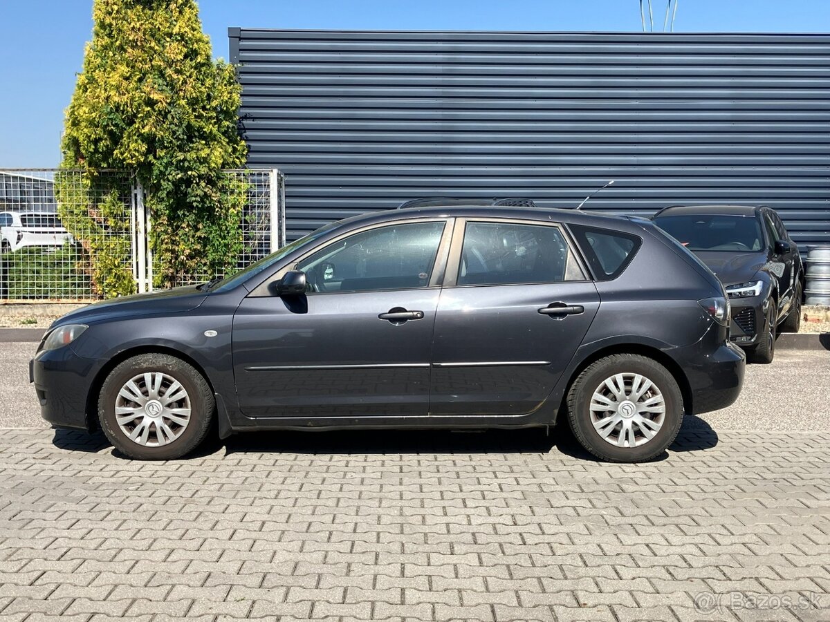 Mazda 3 1.4i Comfort 62 kW M5 - 2