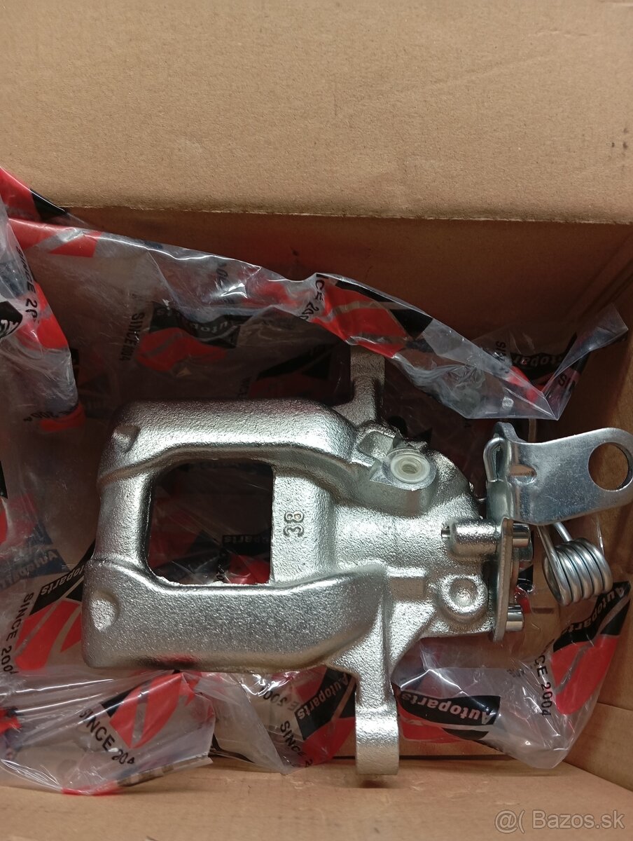 Predám nový zadný brzdový strmeň Škoda/Golf,viď fotto - 2