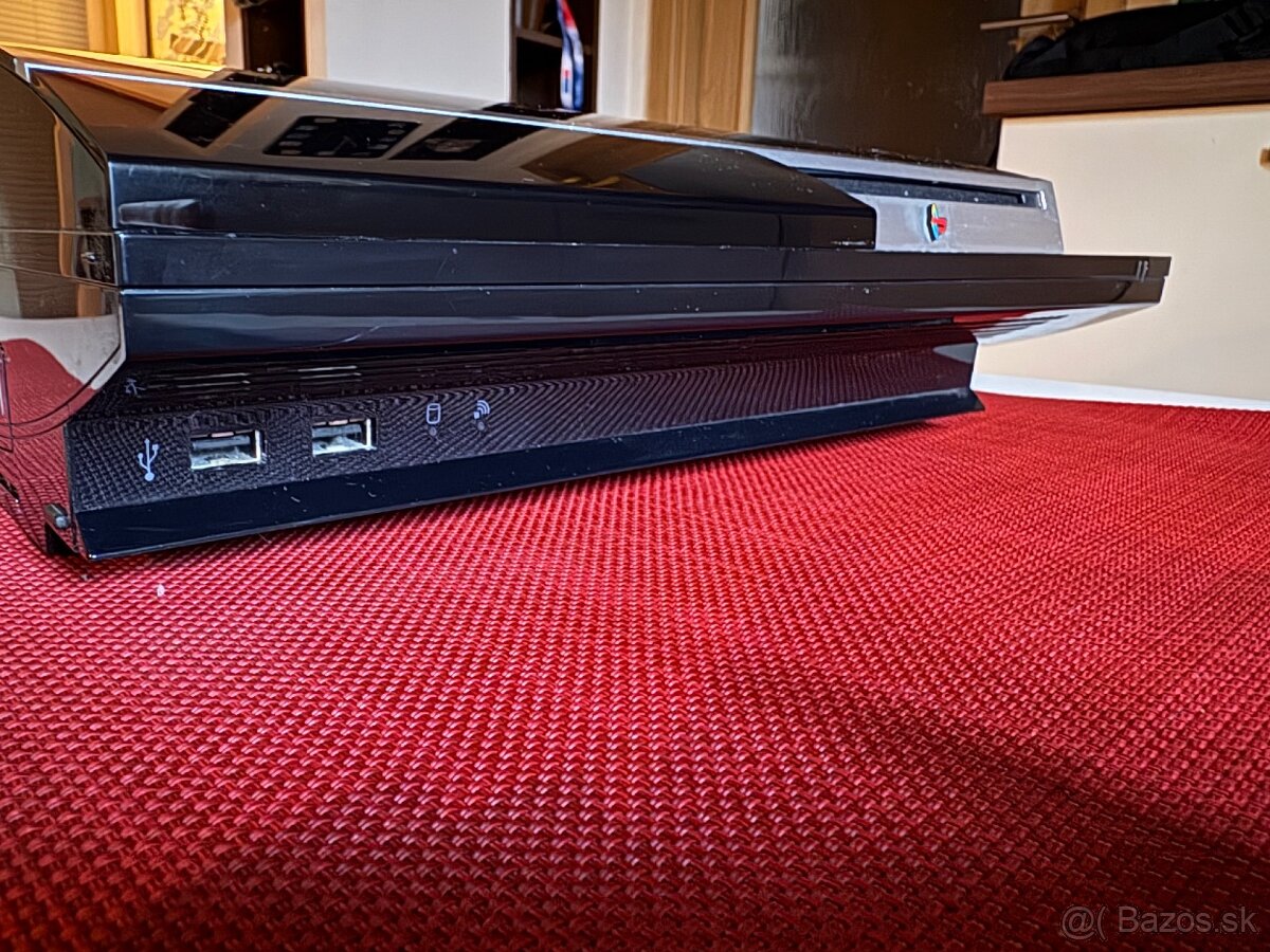 PlayStation 3 + 2 ovladače + hra Rayman - 2