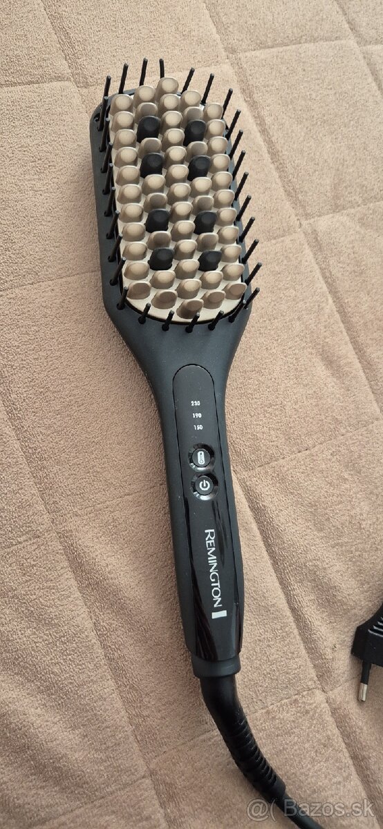 Žehliaca kefa Remington - 2